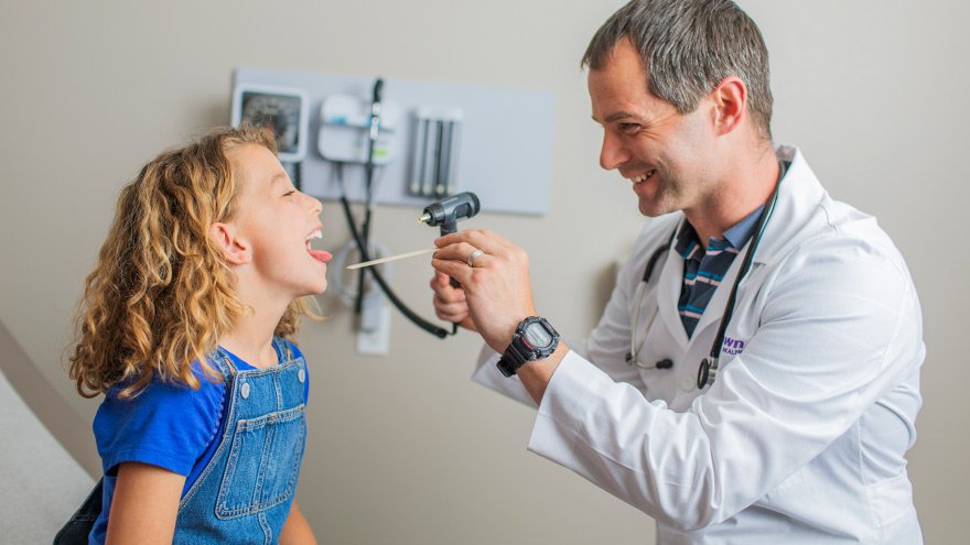 Renown provider examining little girl