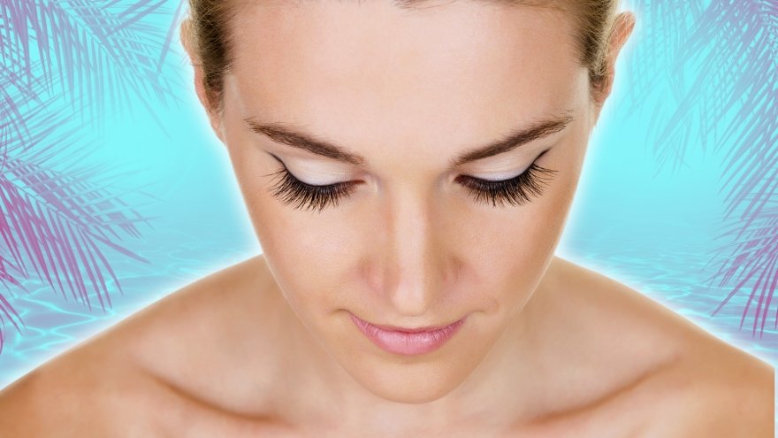 Woman looking down showing off lashes