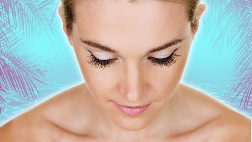 Woman looking down showing off lashes