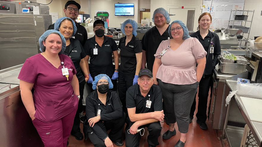 Group of Food and Nutrition Services workers at Renown pose for a photo.