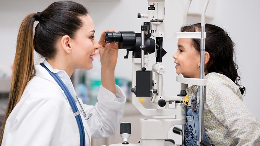 provider examining child's eyes