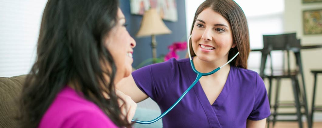 Home Care Team Member Caring for Patient