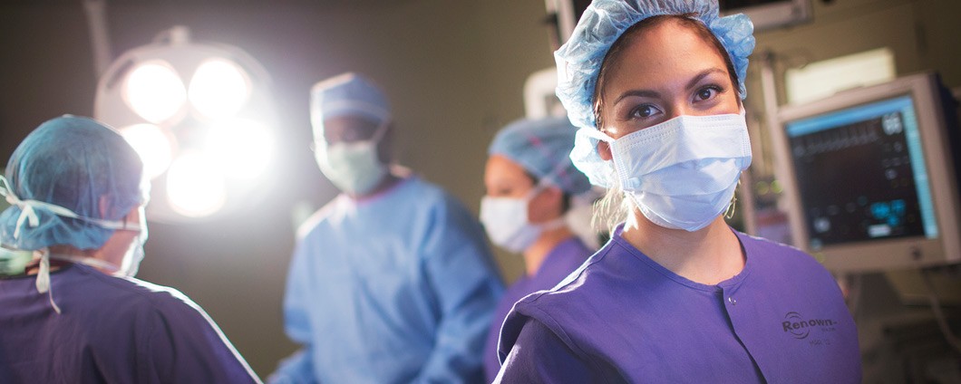 Renown nurse consults with patient and family member