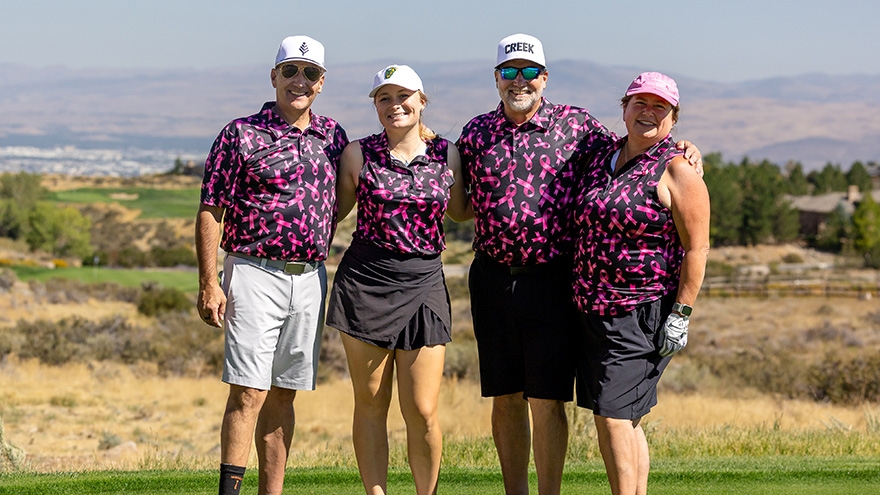 Group of participants posing for photo on ArrowCreek.