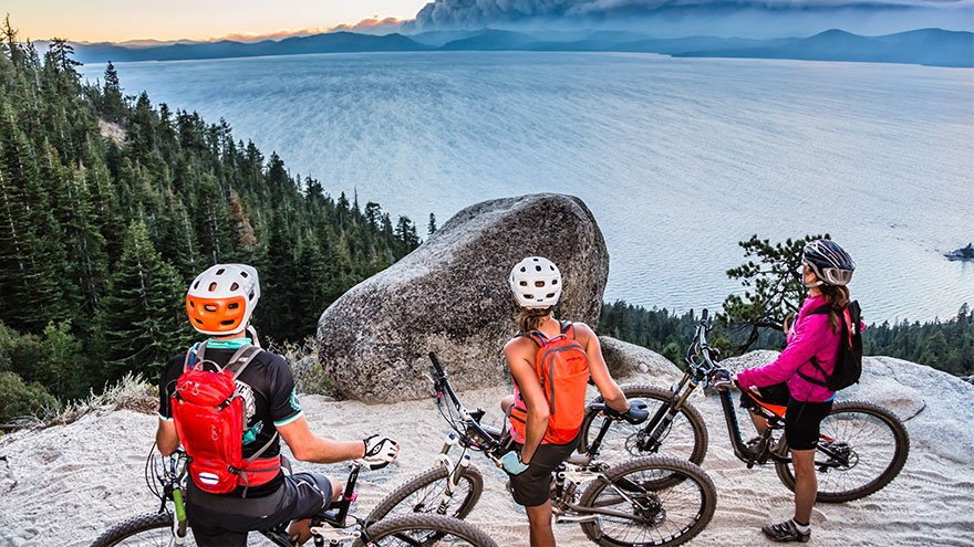 Bikers pause on the Flume Trail at Lake Tahoe