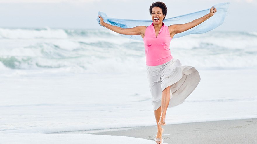 Woman running on beach