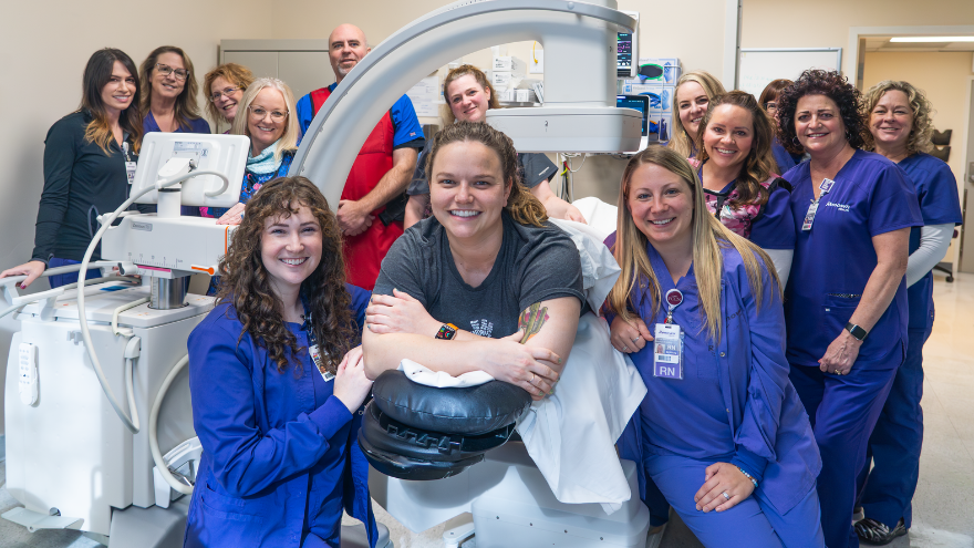 The Special Procedures Pain Management team at Renown Health pose for a photo in a treatment room at Renown Rehabilitation Hospital.