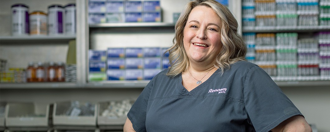 Renown employee poses in her workplace
