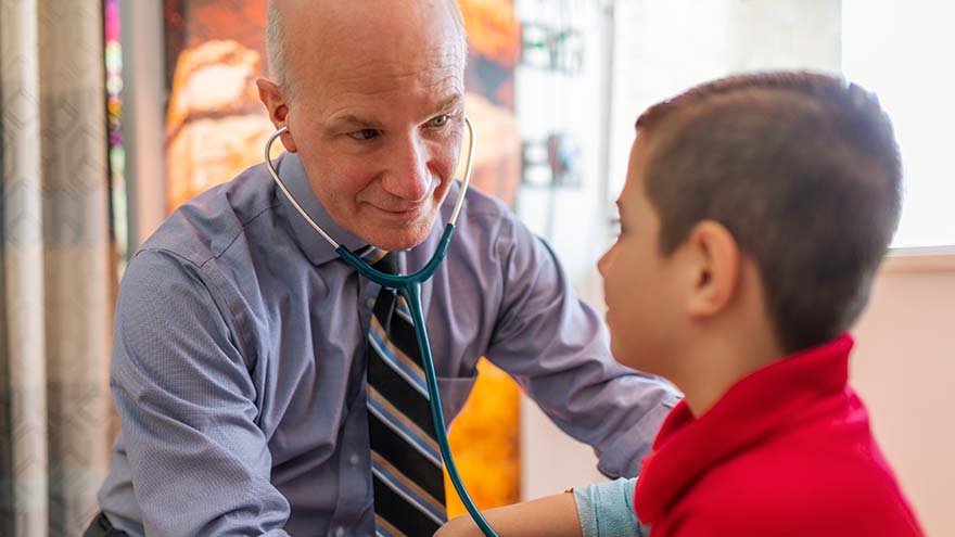 Dr. J. Martin Johnston, Renown Health's Chief of Hematology and Oncology with Patient