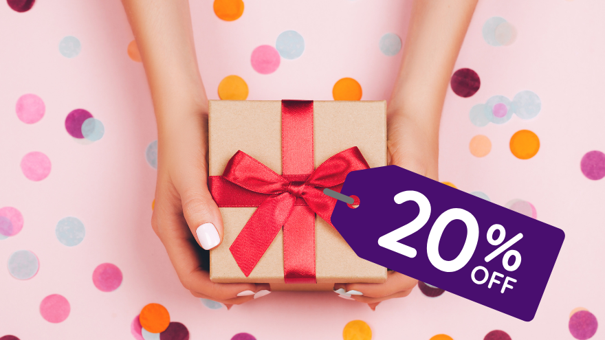 Woman holding present with 20% off sticker
