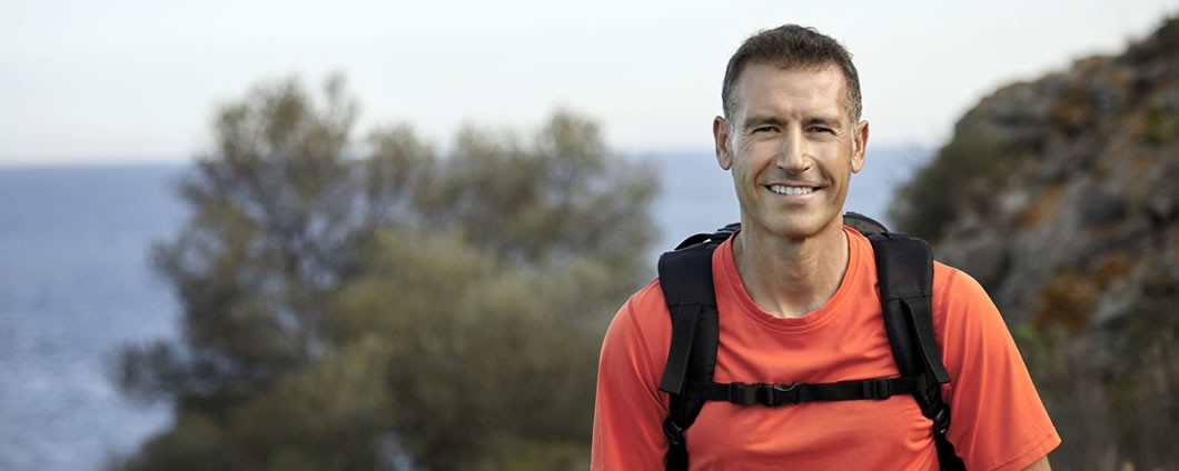 Man Hiking Near Lake