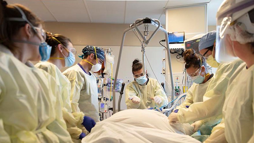 Renown providers caring for a COVID-19 patient
