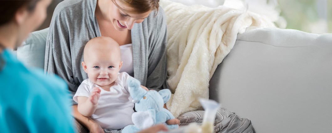 New mom at a lactation consultant appointment