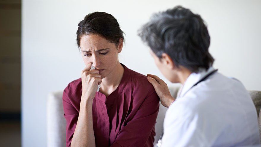 Woman being comforted 