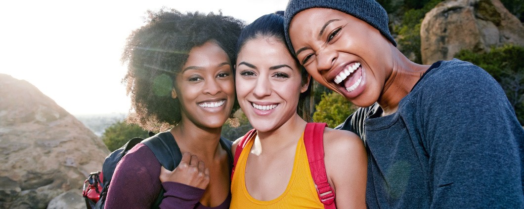 Portrait of smiling women hiking
