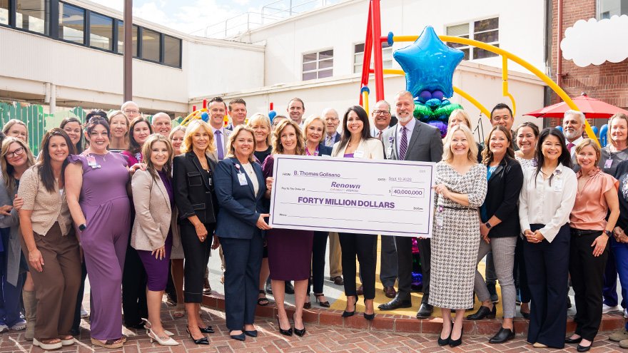 Renown personnel gather to celebrate a historic donation from the Golisano foundation.