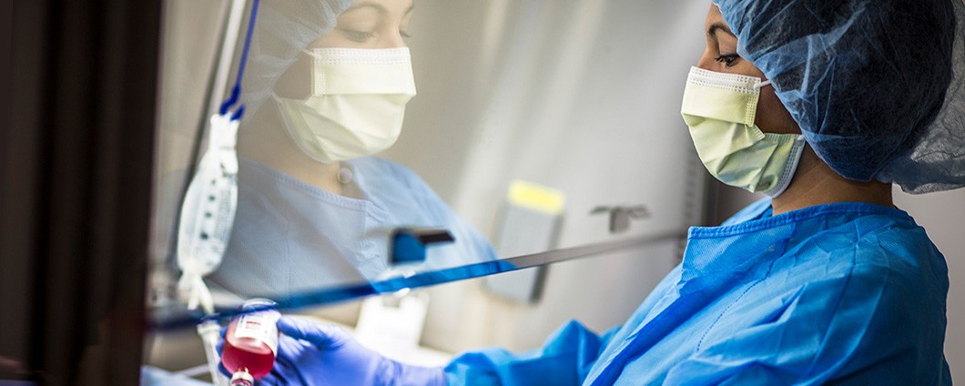 Renown Health researcher working with blood sample