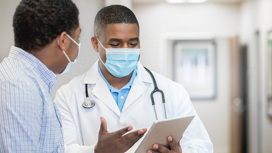 Renown Urgent Care doctor with patient