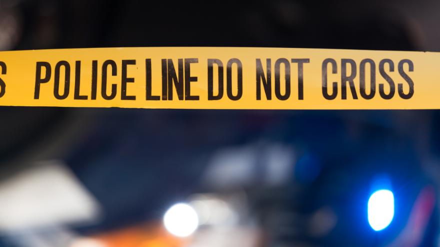 police line yellow ribbon do not cross