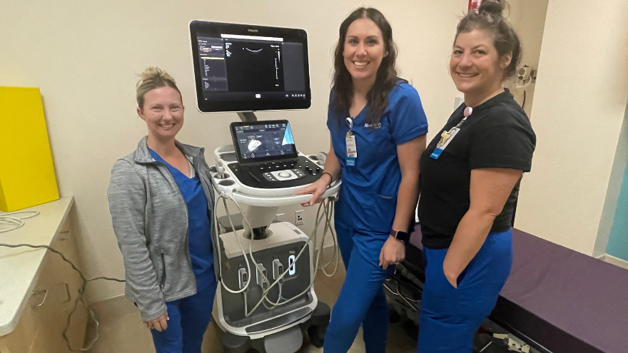 A group of imaging professionals at Renown pose for a group photo.