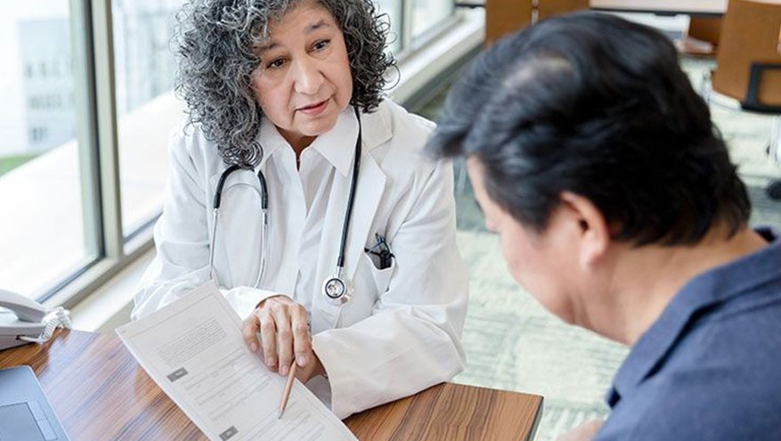 Provider talking with patient