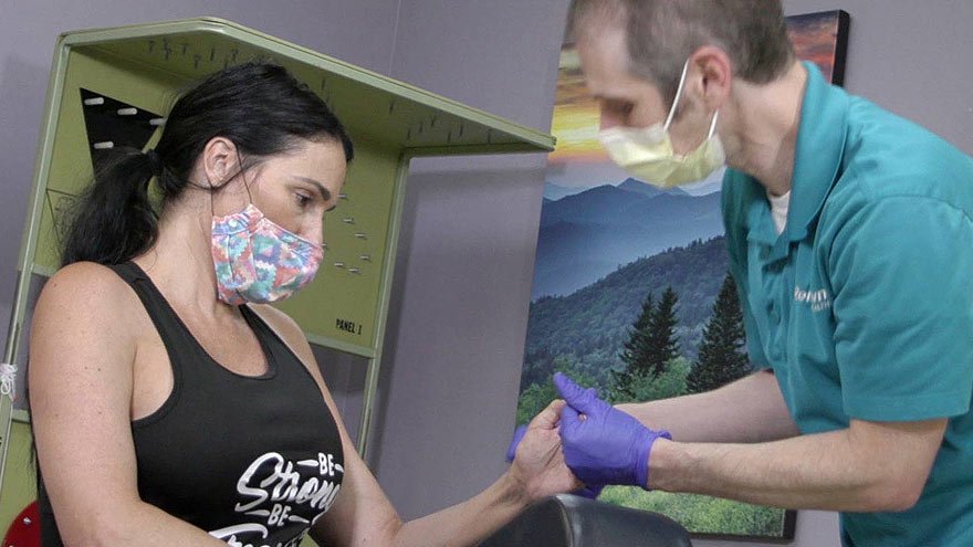 A doctor examining a patient 