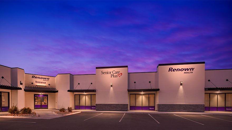 Renown Del Monte location with a purple and blue sunset