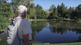 Woman overlooking lake