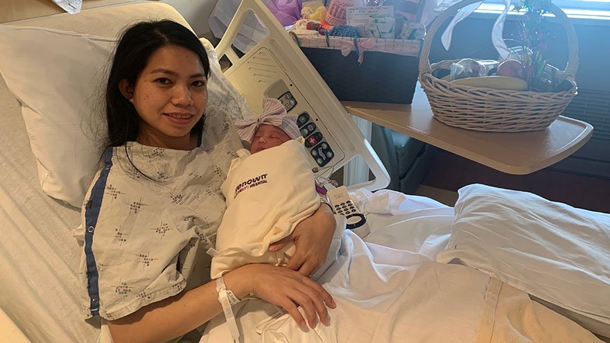 mom and baby in hospital bed