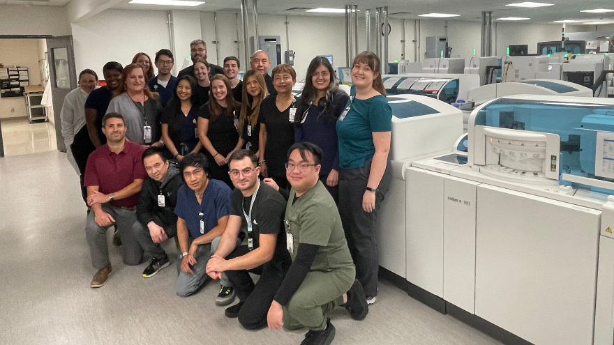 The Core Lab team at Renown Regional Medical Center pose for a group photo in their lab.