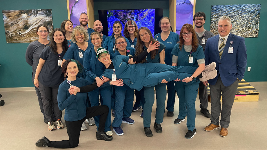 Renown Health's Inpatient Rehab Hospital department poses for a group photo in the rehab gym.