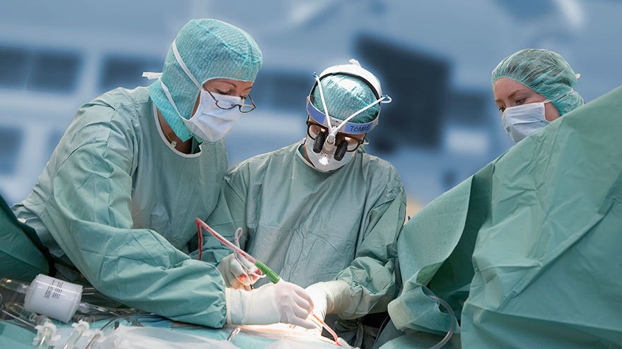 Team of female surgeons operating on a patient