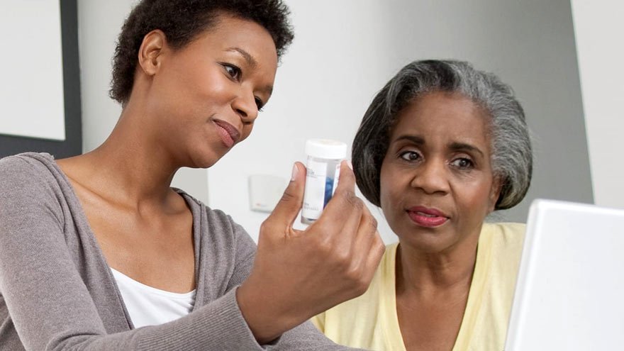 Women talking about a medicine 
