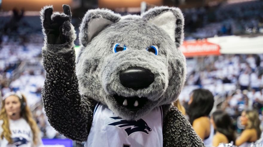 Wolfie mascot from Nevada poses for photo