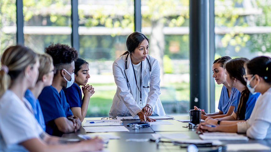 Research team sitting around a table 