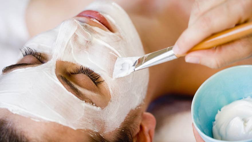Woman enjoying a facial treatment