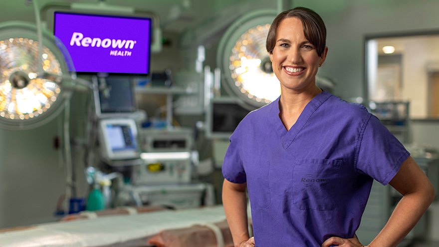 Dr. Gingrich posing in surgery room