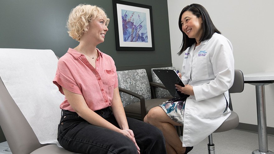 Provider speaking with patient at the Renown Health Conrad Breast Center