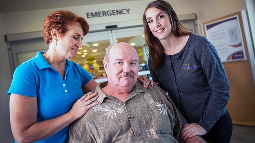 Family and nurse outside Renown ER