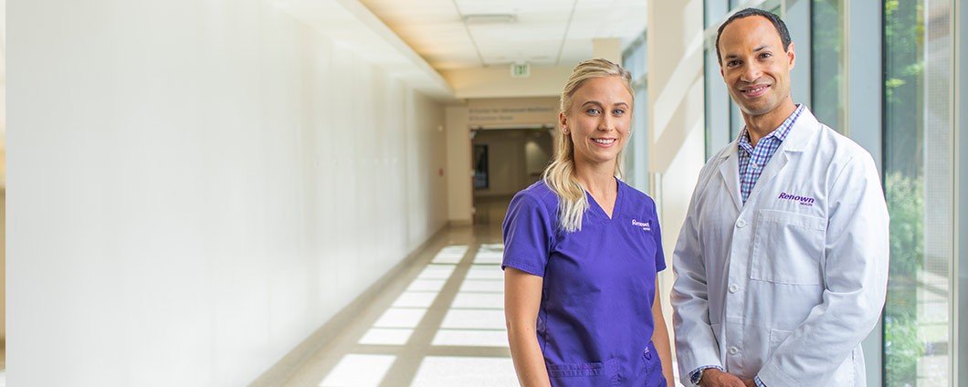 Dr. Morgan with nurse in main hallway
