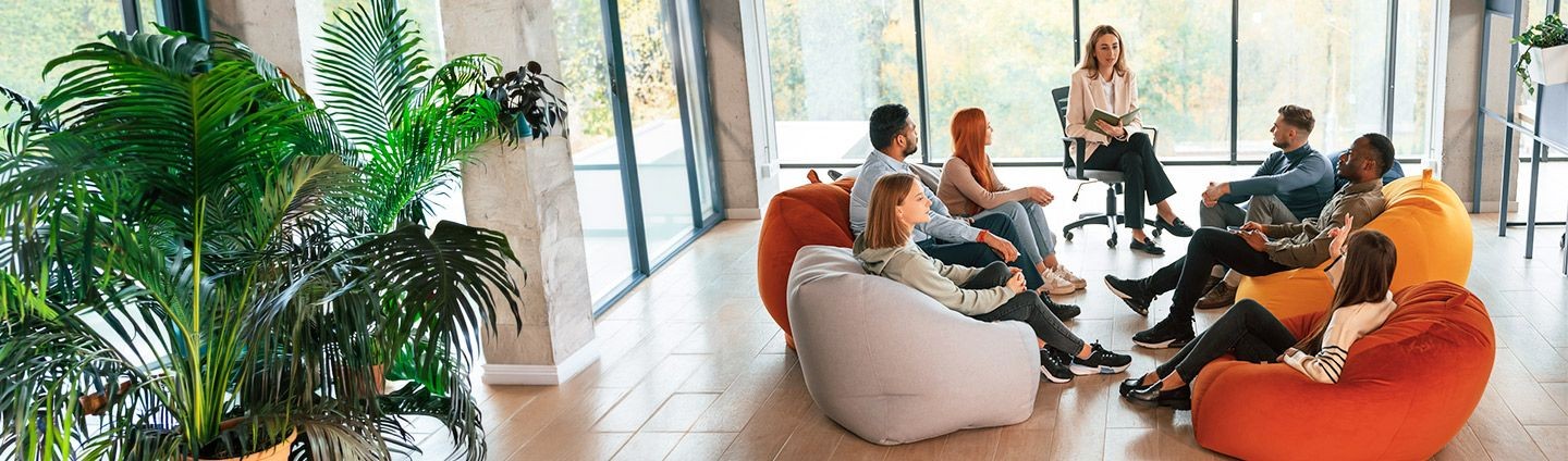 Adults participating in a group therapy session
