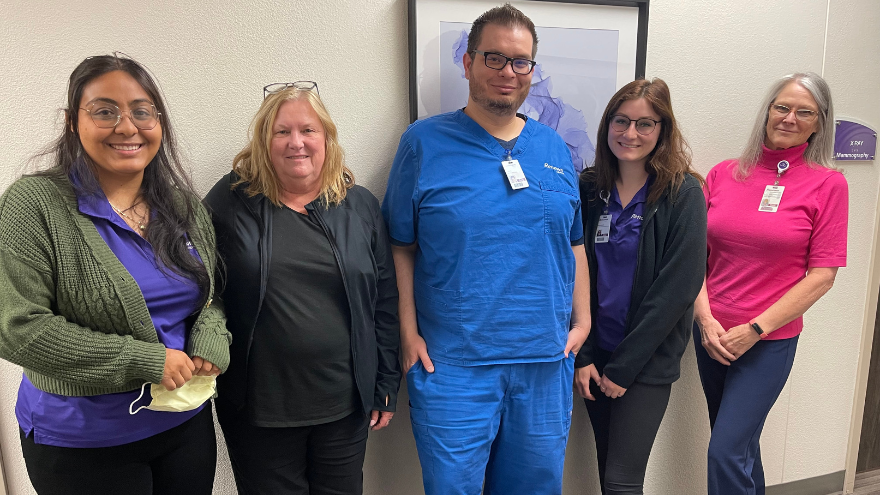 A group of imaging professionals at Renown pose for a group photo.
