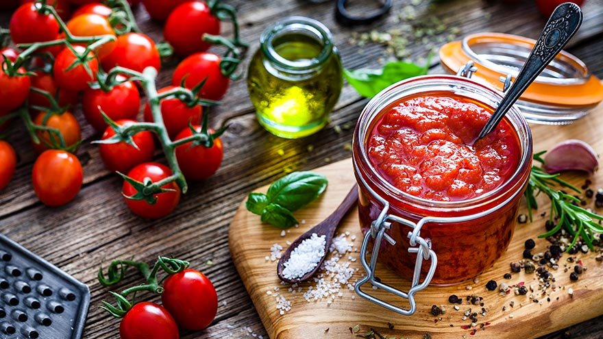 Tomatoes and its derivatives on a table