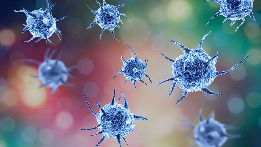 various floating virus pathogens and bacterial cells on a glowing scientific background