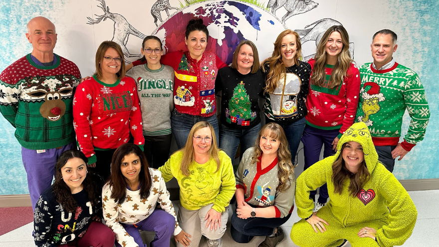 The Children's Infusion Services team at Renown Children's Hospital poses for a Christmas card photo.