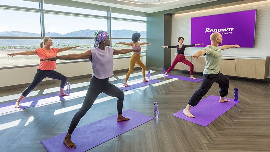 Yoga class at The Meadow, a multi-purpose space for exercise, meditation, and support groups