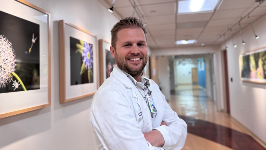 Aaron Andersen poses in hallway at renown regional medical center