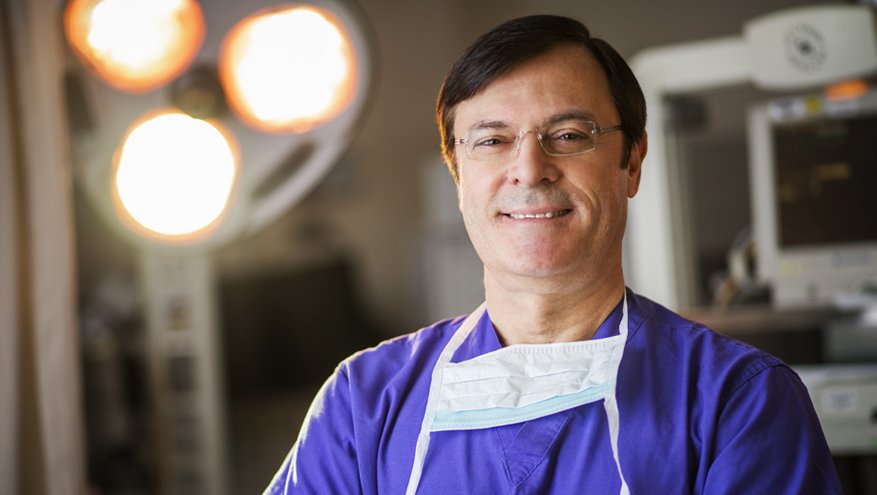 Renown heart surgeon posing in operating room