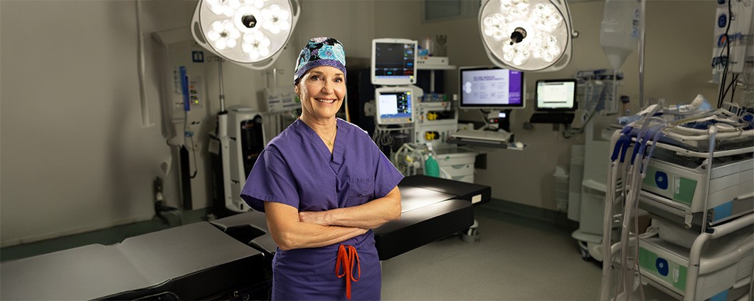 Renown Gastroenterologist posing in operating room