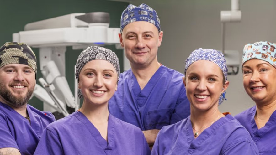 Kenz Lucia poses with her surgery team at Renown South Meadows.